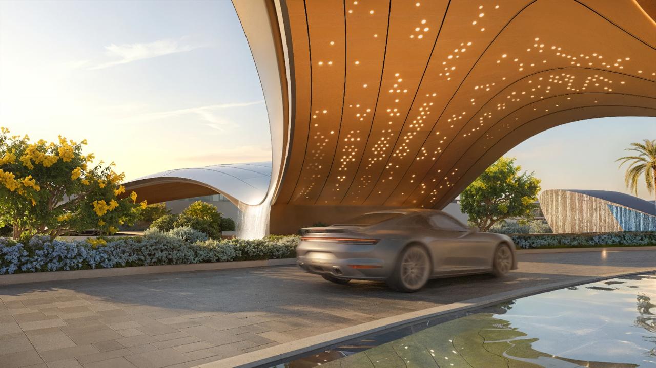 Azizi Florence Sharjah &mdash; the illuminated gateway canopy and arrival drive