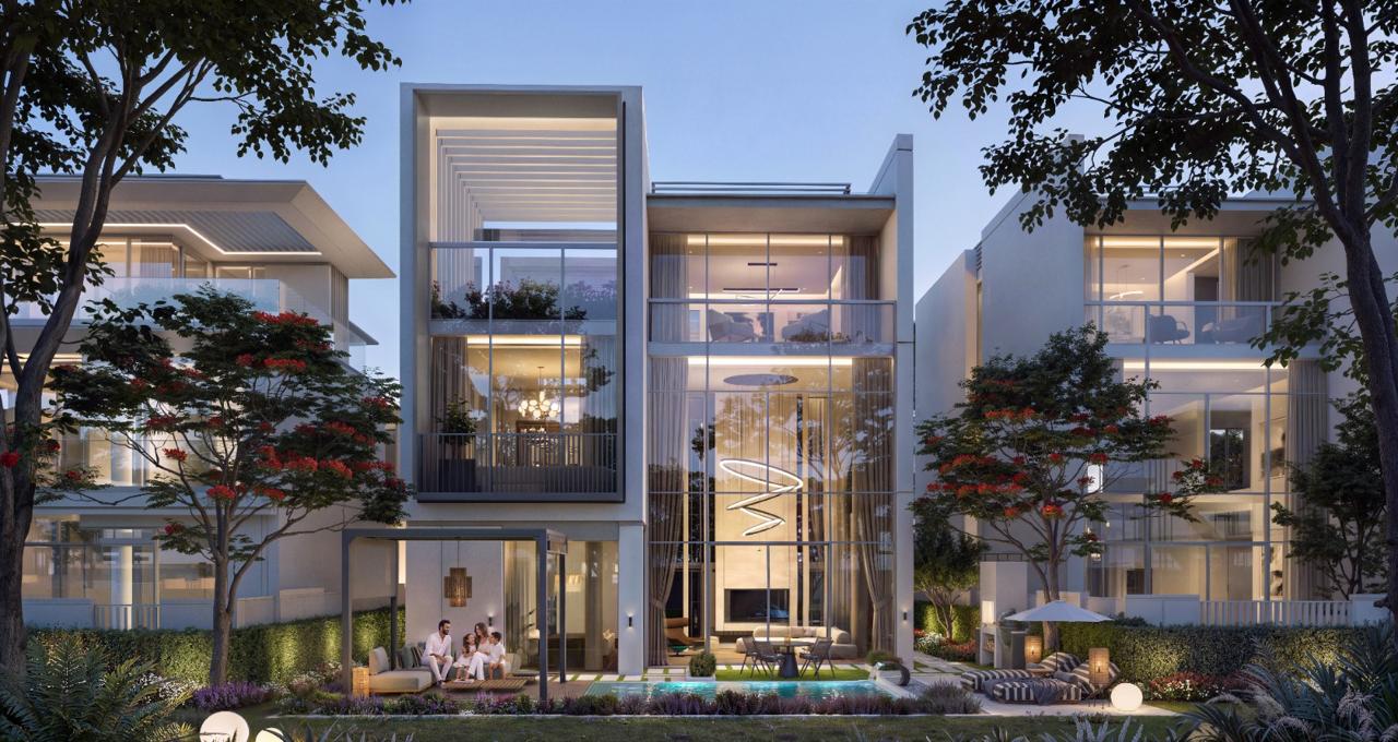 Azizi Florence Sharjah &mdash; a six-bedroom villa and private garden at dusk