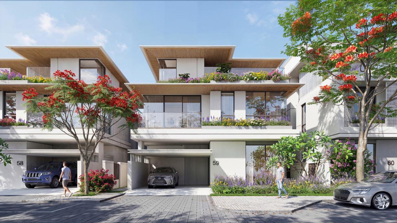 Azizi Florence Sharjah &mdash; a townhouse cluster street with timber roof canopies