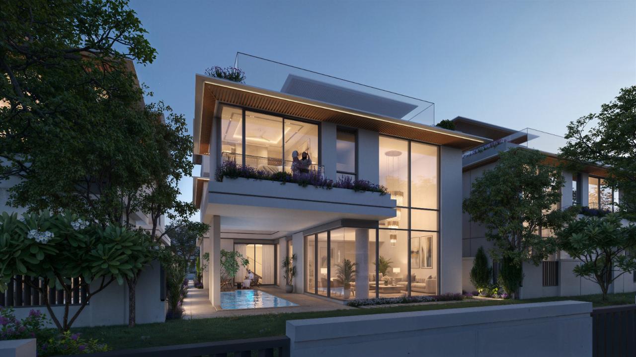 Azizi Florence Sharjah &mdash; a villa terrace and pool in the evening