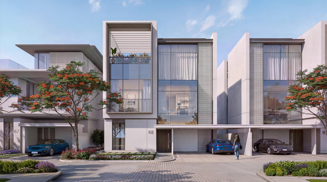 Azizi Florence Sharjah &mdash; a villa street elevation with flame trees